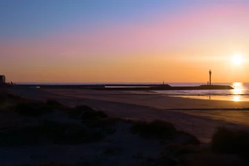 Fototapeten Sunset at the beach © Gjurdis
