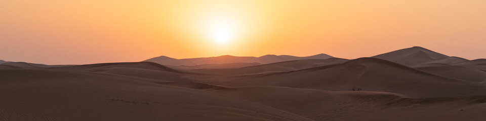 Landscape of desert dunes at sunset - 428733600