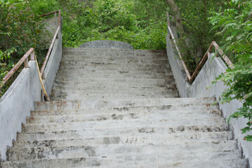 Brown stairway up the hill