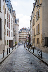 Obraz na płótnie Canvas A romantic street in old town Paris