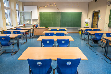 empty classroom in germany due to Corona virus as school are closed schools stay open during Covid cases