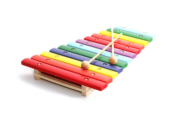 Children's colorful bright wooden xylophone isolated on a white background. A musical instrument.
