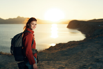 woman with backpack travel freedom walk lifestyle