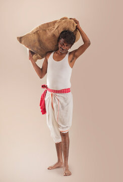 A FARMER CARRYING HIS PRODUCE 	