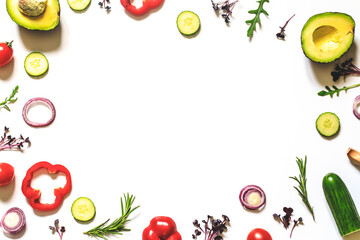 Fototapeta na wymiar Creative layout of tomatoes, cucumbers, bell peppers, avocados and salads. flat lay. Food concept. place for your text