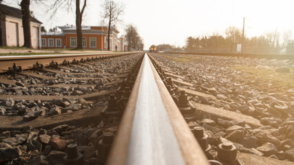 Railway tracks and train on a sunny day. Railway station