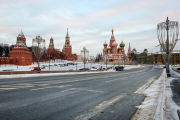 MOSCOW, View of Vasilievsky Spusk, Red Square, St. Basil's Cathedral and the Spasskaya Tower of the Moscow Kremlin on a frosty winter morning