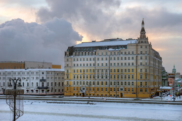 View of the Balchug Kempinski Hotel on Balchug Street and Raushskaya Embankment in Moscow, near Kreml embankment on a frosty winter morning.
