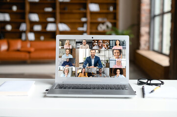 Laptop screen webcam view different ethnicity age people engaged in group videocall. Video conference lead by european businessman leader. Modern technology, easy convenient on-line meeting concept