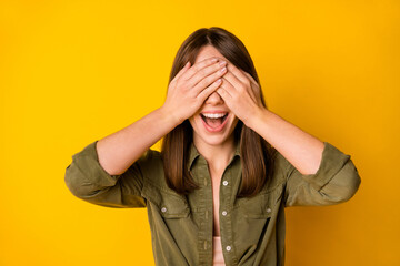 Photo of funny crazy lady palms cover eyes open mouth wear green shirt isolated yellow color background