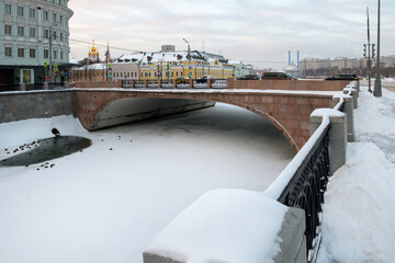 View of the Small Moskvoretsky Bridge to the drainage channel in Moscow on a frosty winter morning