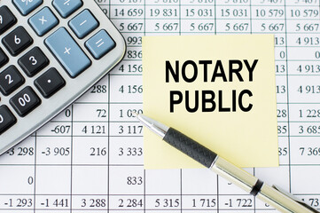 yellow card with the inscription NOTARY PUBLIC on the office table, business concept
