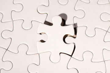 Top view of white jigsaw puzzle