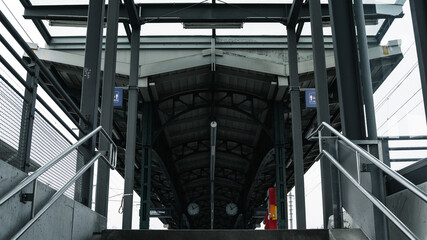 Stairs leading to a train station somewhere in europe.