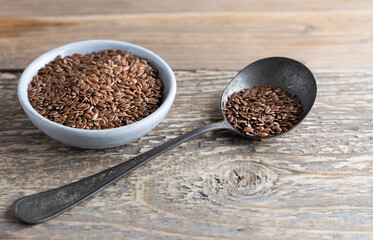Healthy super foods Chia and flax seeds in a bowl ready to eat. These seed are very healthy and can...