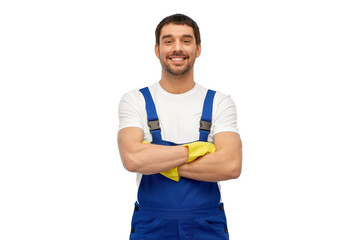 profession, cleaning service and building concept - happy smiling male worker or cleaner in overall and gloves over white background