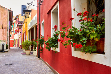 Among the colorful alleys of Caorle city