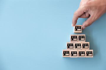 Franchise business concept,hand choose wood blog with franchise marketing.