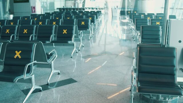 Airport Lounge With Empty Seats Marked Unavailable