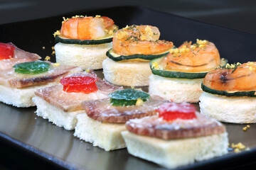Assorted canape with shrimp and zucchini, homemade party food