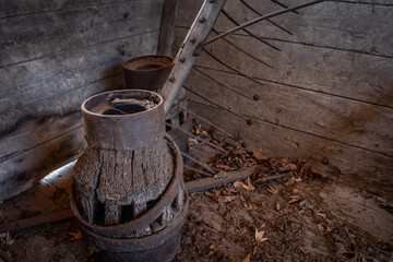 Old  vintage rake against wooden wall