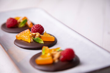 Músico chocolate with fruit and nuts.