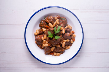 Pork salchichas with eggplant and paprika.