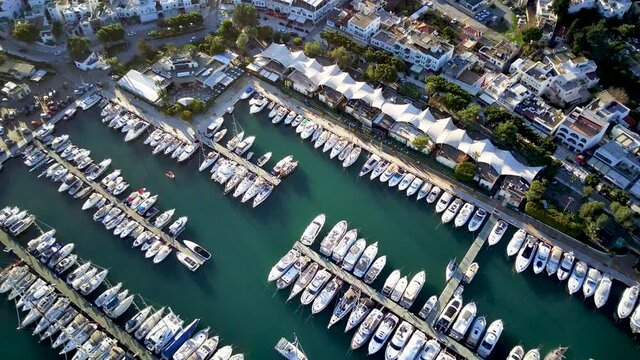 Amazing panoramic view from drone of beautiful full of yachts Bodrum harbour and ancient Kalesi castle in Mugla province in Turkey