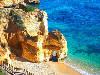 Beautiful paradise beach Praia do Camilo with cliffs in Lagos at the Algarve coast of Portugal