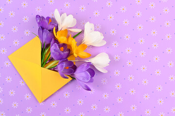 bouquet of crocuses in a yellow envelope