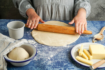 tequeno typical snack of venezuelan food  - woman chef making tequeños or cheese fingers typical venezuelan dish