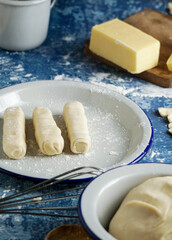 tequeno typical snack of venezuelan food  - woman chef making tequeños or cheese fingers typical venezuelan dish