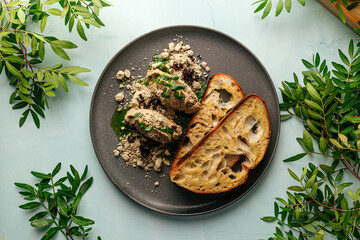 Toasts and chicken liver pate with halva and prunes 