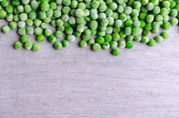 Fresh frozen peasground on grey background . with copy space