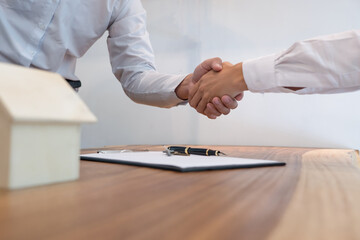 Business people signing contract making deal with real estate agent Concept for consultant and home...
