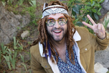 Hippie showing the peace sign