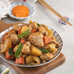 Homemade delicious cubed chicken with braised potato chunks.