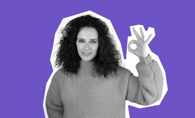 Beautiful woman shows a gesture of ok, magazine fashion style