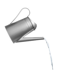 Pouring liquid from watering can on white background