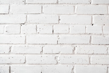 Obraz premium Brick wall painted with white paint