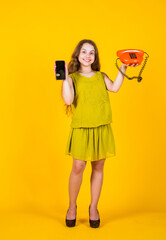 pleasant conversation. business communication. child with vintage and modern telephone. childhood development. pretty teenage girl in dress talk on phone. kid speak on retro phone. fashion and beauty