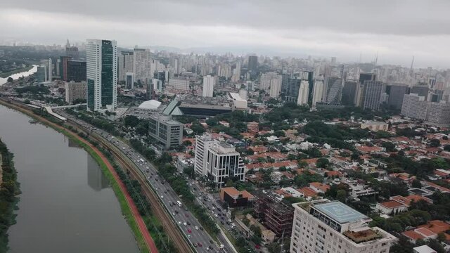 Drone aerial view City of Sao Paulo, district Chacara Itaim, river Pinheiros, av das na es unidas, shooting with a drone 4k 24 fps, river, car traffic, buildings cityscape and Sao Paulo city skyline. 