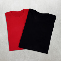  Blank Black and red t-shirt over grey desk.
