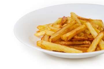 French fries on a white dish close-up