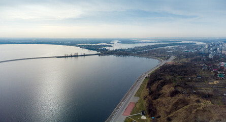 Aerial view of reservoir, dam with hydroelectric power station