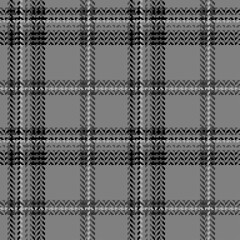 Black and  white plaid pattern a herringbone.
