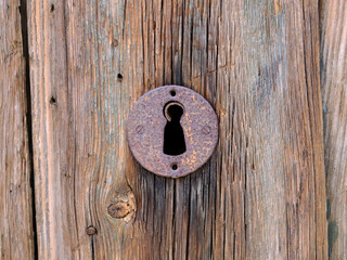 Old lock on wooden door