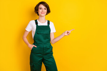 Photo of pretty person arm in pocket indicate finger empty space proposition isolated on yellow color background