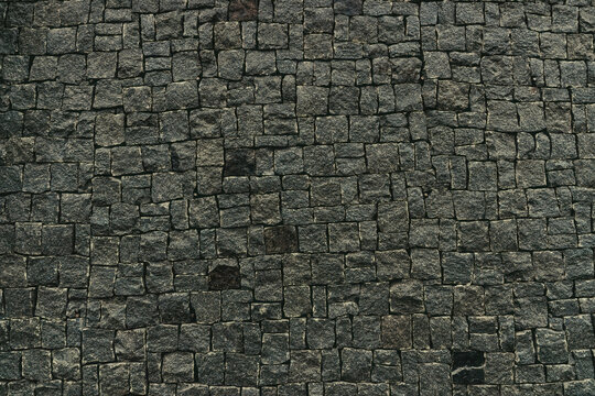 Rough texture of black granite tiles	