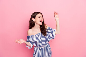 Profile photo of nice optimistic brunette lady dance wear blue dress isolated on pastel pink color background